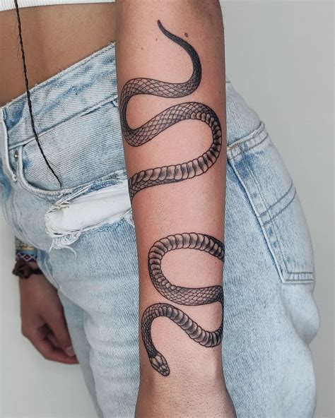 wrap around snake tattoo arm|226+ Snake Wrapping Around Arm Tattoo Ideas